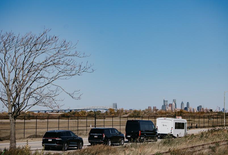 Four vehicles heading in to a city