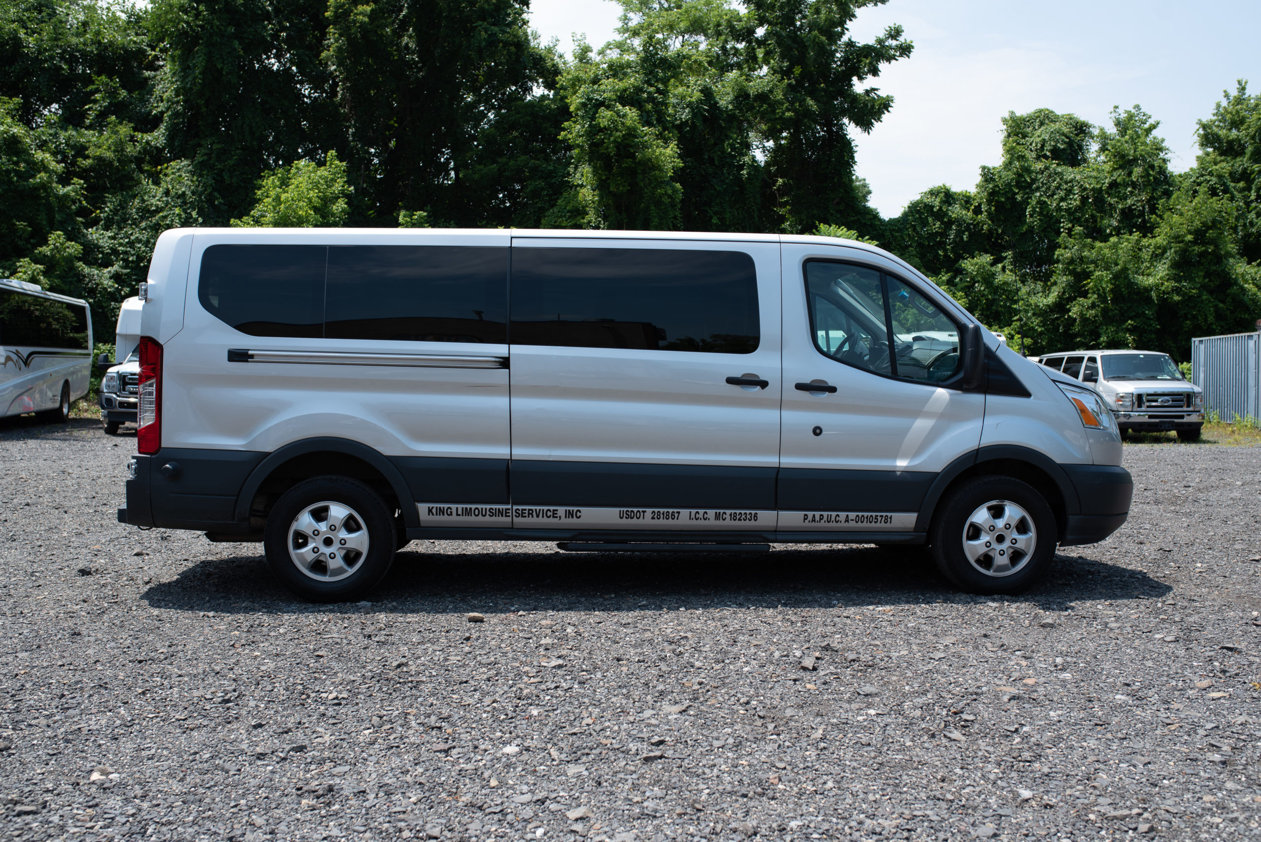 Black SUVs on a highway